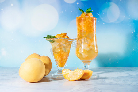 食物夏季黄桃饮品室内水果饮料摄影图配图