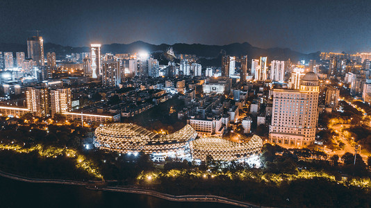 金鱼简图摄影照片_城市夜晚广西柳州金鱼巷风光航拍河边无人机摄影图配图