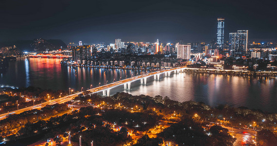 城市夜晚柳州文昌大桥夜景航拍岸边无人机摄影图配图