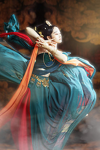 古典传统风摄影照片_中国传统文化白天飞天的美女室内飞天动作摄影图配图