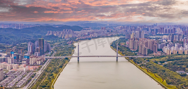 城市夕阳广西南宁白沙大桥风光航拍岸边无人机摄影图配图