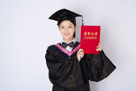 红色毕业季摄影照片_博士人像白天一个女学生室内开心的拿着证书摄影图配图