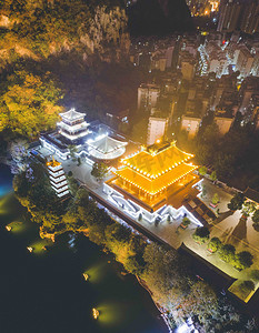 柳州风景摄影照片_城市夜晚广西柳州文庙夜景航拍寺庙无人机摄影图配图