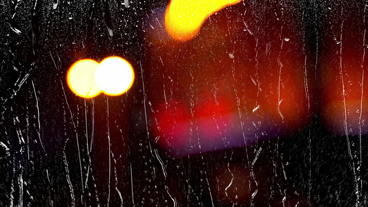 下雨空境摄影照片_拍摄夜晚下雨雨水划过玻璃