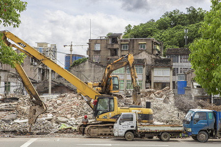 轴测工地摄影照片_工地挖掘机下午挖掘机城市物摄影图配图