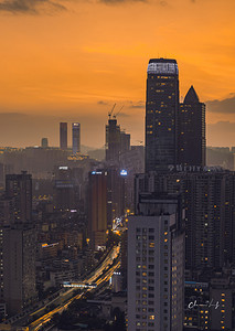 夕阳色彩傍晚建筑城市摄影摄影图配图