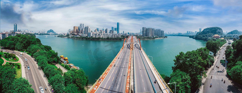 城市正午广西柳州文惠桥全景风光江畔无人机摄影图配图