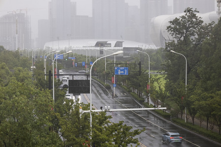 杭州奥体中心网球摄影照片_台风天下午奥体中心奥体中心台风摄影图配图