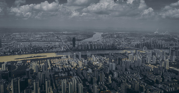 台风摄影照片_城市清晨暴风雨来临前夕楼顶无人机摄影图配图