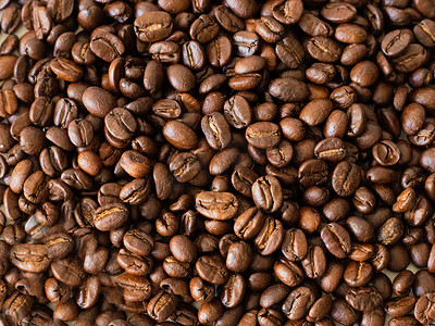 平铺咖啡豆白天咖啡豆咖啡厅喝咖啡摄影图配图
