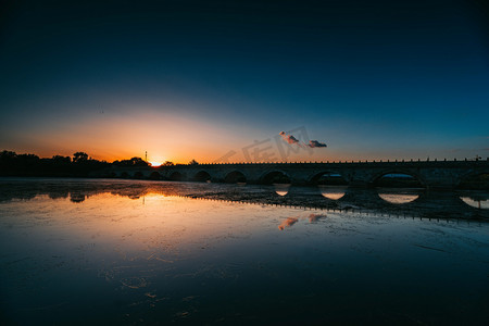 抗日胜利摄影照片_北京红色景点白天夕阳下的卢沟桥户外无摄影图配图