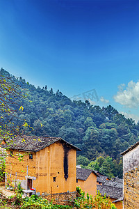 白云动图摄影照片_秋季风光早晨房屋山区漂动摄影图配图