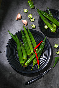 蔬菜棚拍秋葵餐饮食材新鲜秋葵摄影图配图