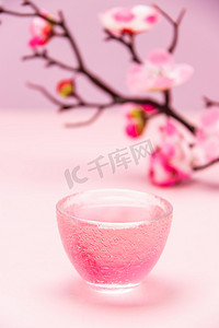 粉红色白天桃花酒室内桃花摄影图配图