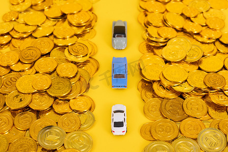 金币汽车销售创意金融摄影图配图