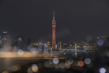 夜景广州摄影照片_广州塔梦幻光斑夜晚建筑天台拍摄摄影图配图