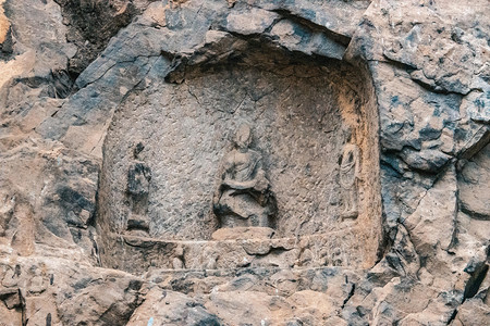 石窟佛像白天佛龛洛阳龙门山旅游摄影图配图