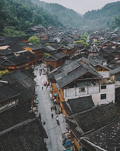 贵州侗族摄影照片_城市中午贵州肇兴侗寨航拍景区无人机摄影图配图