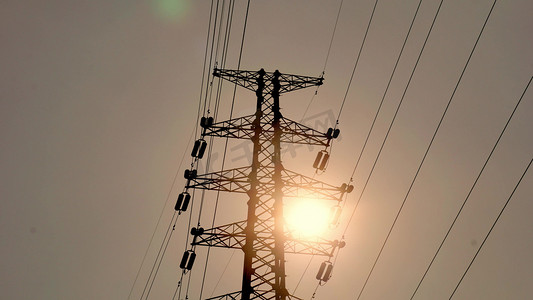 电力塔日落夕阳摄影拍摄太阳下山