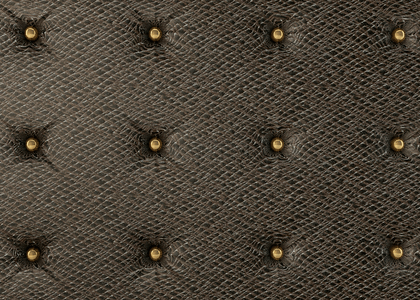 棕黑色复古家具金色圆珠皮革纹理背景