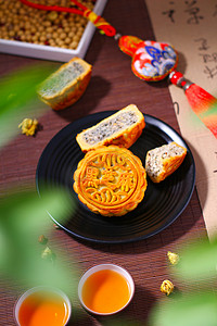 美食中秋节月饼黑芝麻月饼健康生活摄影图配图