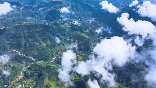 山川云雾摄影照片_航拍云南山脉峡谷风光大山深处云雾缭绕