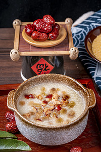 毋米粥火锅摄影照片_中式传统早点美味红枣米粥摄影图配图