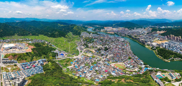 田野国风摄影照片_城市中午广西融水全景风光航拍山顶无人机摄影图配图