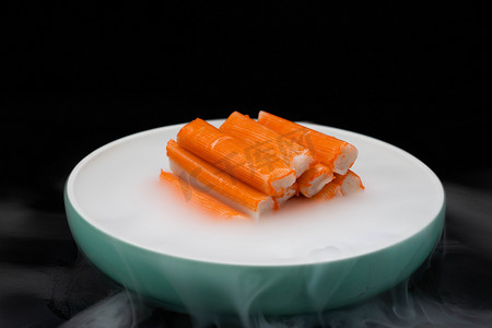 海鲜火锅食材摄影照片_食品白天蟹棒室内食物摄影图配图