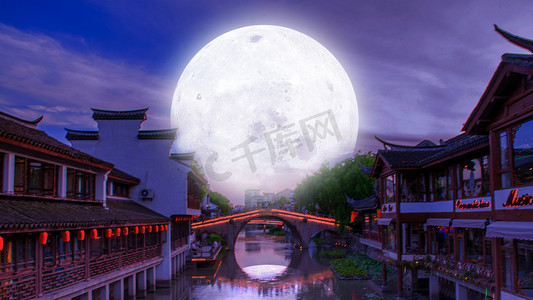 古镇中秋月满楼夜晚古建月亮中秋节赏月摄影图配图