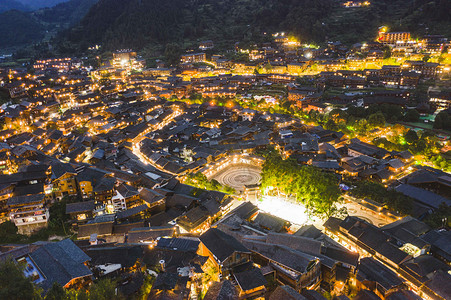 城市夜景城市摄影照片_城市夜晚贵州西江夜景风光航拍景区无人机摄影图配图