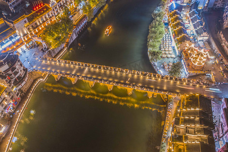 东南摄影照片_城市夜晚贵州镇远古城盘龙大桥夜景航拍景区无人机摄影图配图