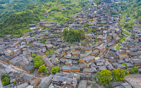 贵州建工摄影照片_城市中午贵州西江千户苗寨全景风光景区无人机摄影图配图