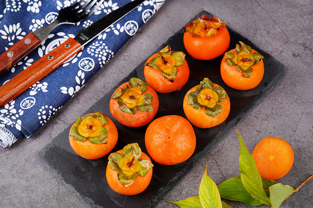 爆甜摄影照片_甜软营养秋季美味柿子摄影图配图