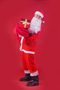 圣诞老人礼物人像圣诞节特色节日摄影图配图