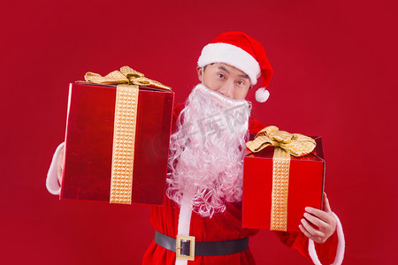 圣诞老人圣诞人像礼物盒特色节日摄影图配图