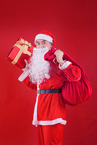 圣诞老人人像圣诞节礼物盒子特色节日摄影图配图