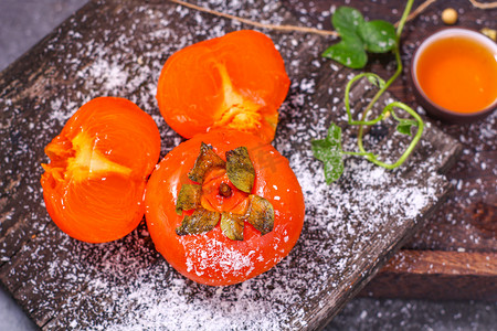 水果秋天柿子红色柿子霜降摄影图配图