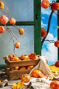 秋季红色摄影照片_秋季水果柿子摄影图配图