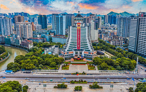 风景贵州摄影照片_城市建筑夕阳贵州贵阳贵阳民族博物馆航拍摄影图配图