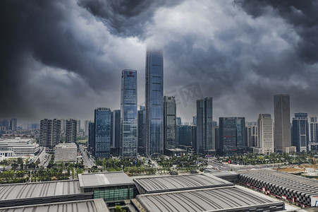 暴雨城市摄影照片_城市建筑暴雨城市建筑群贵阳观山湖区航拍摄影图配图