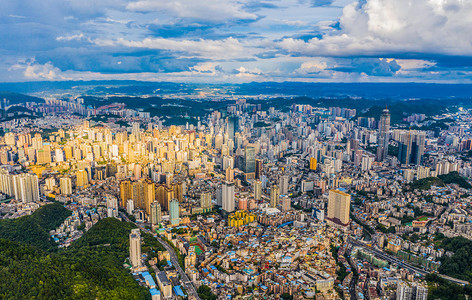 贵阳城市摄影照片_城市建筑日落城市风景山顶航拍摄影图配图