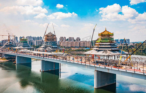 现代建筑正午凤凰岭大桥施工建筑航拍摄影图配图