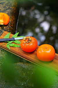 二十四节气秋天摄影照片_二十四节气户外柿子美味摄影图配图