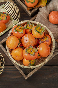 美味糯香新鲜软柿子水果摄影图配图