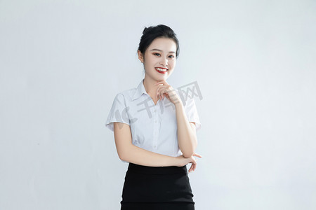 女士商务摄影照片_客服商务人像礼仪微笑摄影图配图