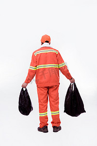 劳动者图摄影照片_背影环境卫生垃圾清扫垃圾袋劳动者摄影图配图