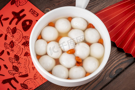 春节传统食物摄影照片_元宵节传统食物甜品汤圆子摄影图配图