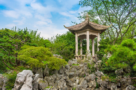 南京机场摄影照片_南京钟山风景名胜区明孝陵红楼艺文苑假山石亭摄影图配图