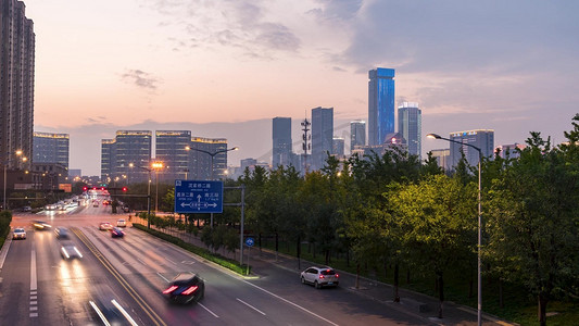 夜景道路摄影照片_城市写字楼灯光车流夜景